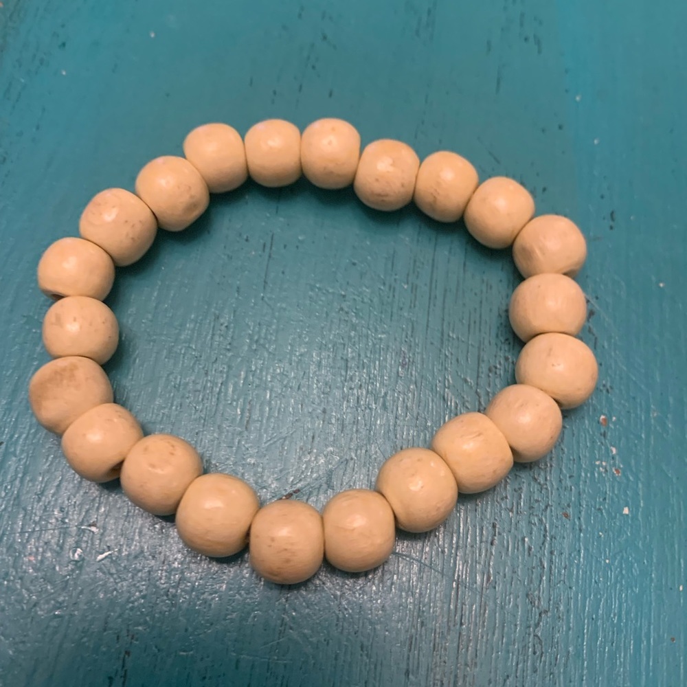 Cream colored wooden bead bracelet